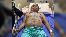 Brazilian President Bolsonaro rushed to hospital after 10 days of hiccups, may need surgery