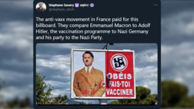 Investigation opened into giant Macron-Hitler billboard comparing Covid policy to Nazi regime