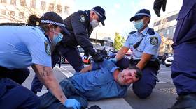 Disgruntled Australians scuffle with police at banned ‘Freedom’ marches as Covid-19 lockdown extended in Sydney (PHOTOS, VIDEOS)