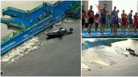 ‘Bloody ridiculous’: Shambolic scenes as BOAT blocks start of men’s Olympic triathlon race in Tokyo (VIDEO)