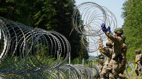 EU hopes suspension of Baghdad-Minsk flights will stem migrant flow to Lithuania as Vilnius debates giant border fence