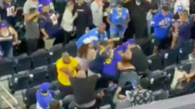 WATCH: NFL fans plunge face-first down stairs after getting KO’d in wild brawl… before one gets stomped on