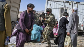 7 killed in Kabul airport chaos as military evacuation INTERRUPTED by desperate Afghan civilians after regular flights CANCELED