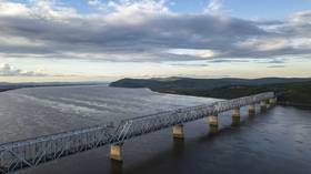 Russia completes railway section of cross-border bridge to China