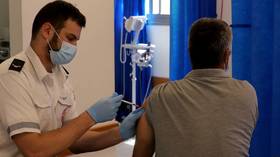 Israel offers Covid-19 vaccine booster shots to all residents 12 and older, says ‘green pass’ will expire six months after jabs