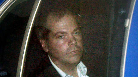 John Hinckley Jr. arrives at the E. Barrett Prettyman US District Court in Washington DC November 19, 2003