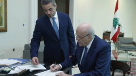 Lebanon announces new government, ending 13 months of political deadlock