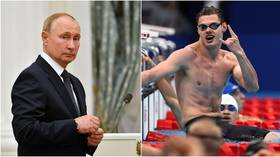 ‘Not in there!’ Putin declines unusual passport signature request from Russian Paralympic star