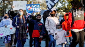 Court blocks North Carolina voter ID law, says it discriminates against black people