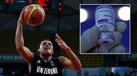 ‘I completely double down’: Basketball star axed for rejecting vaccine... a month after his brother was released over Pfizer claim