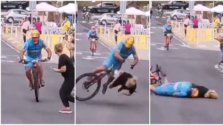 The shocking collision between a cyclist and a fan was caught on camera. © Twitter @Teofilo1952