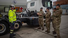 UK Army drivers begin to deliver fuel to petrol stations in London amid shortages