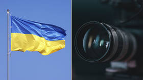 Outcry as Ukrainian bankers ‘ASSAULT’ American state-run media reporters, allegedly seizing cameras & deleting interview footage