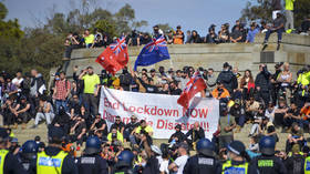 Stasi of the suburbs turn neighbours against each other as Aussie police spend months tracking down anti-lockdown protesters