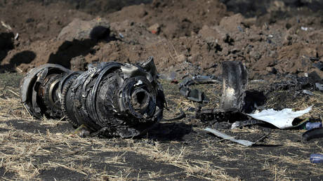 FILE PHOTO: Engine parts are seen at the scene of the Ethiopian Airlines Flight ET 302 plane crash, March 11, 2019