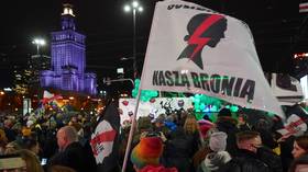 Abortion law protesters back on the streets of Poland after young woman denied termination dies