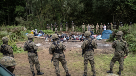 Unable to breach Belarus-Poland border, migrants set up camp (VIDEO)