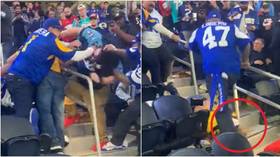 WATCH: NFL fans plunge face-first down stairs after getting KO’d in wild brawl… before one gets stomped on