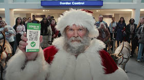 Santa’s vaccine passport prompts supermarket boycott