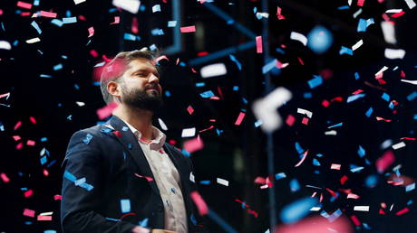 Chile's President-elect Gabriel Boric celebrates with supporters after winning the presidential election in Santiago, Chile, December 19, 2021