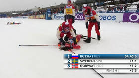 WATCH: Exhausted Russian ski star collapses on finish line after romping to victory
