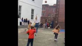 ‘Sports clip of the year’: Elementary school teacher sinks incredible long-range basketball shot (VIDEO)