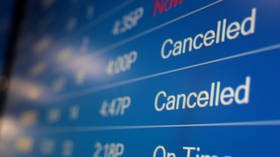 Mass flight cancellations persist on 2021’s final day