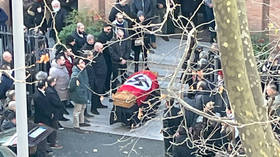 Catholic Church outraged after coffin covered with Nazi flag