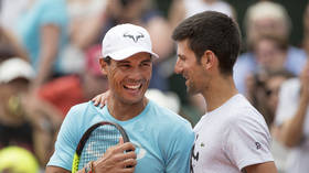 Djokovic reacts to Nadal Grand Slam record