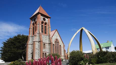 Christ Church Cathedral (1892) and Whalebone Arch (1933), Port Stanley, East Falkland, Falkland Islands. British Oversea Territory. (FILE PHOTO) © (Photo by DeAgostini/Getty Images