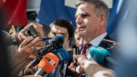 Bulgarian Defense Minister Stefan Yanev, then prime minister, is shown speaking to reporters during a military exercise last July in Varna.