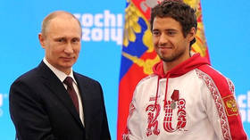 Russian Olympic ski star shares photo with Putin & ‘peace’ message