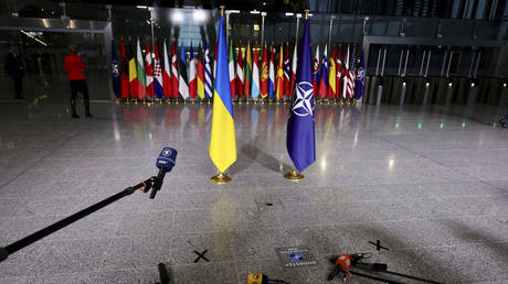 Reporters wait for the arrival of Ukraine's Foreign Minister Dmytro Kuleba and NATO Secretary General Jens Stoltenberg at a meeting of NATO members at the bloc's headquarters in Brussels. Belgium, April 7, 2022.