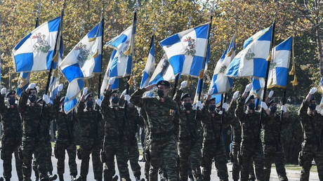 Greek soldiers march in Thessaloniki, Greece, 2021. © Sakis Mitrolidis/AFP