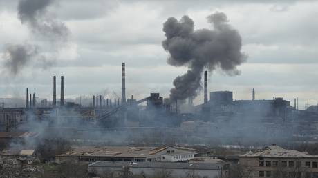 Smoke rises over the Metallurgical Combine Azovstal in Mariupol, April 14, 2022