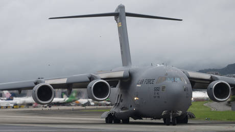 FILE PHOTO. US Air Force C-17 Globemaster III transport aircraft landing at Taipei Shongshan Airport. ©Lin Yen Ting / SOPA Images / LightRocket via Getty Images