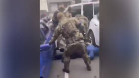 Footage shows Ukrainian troops brutalizing captives