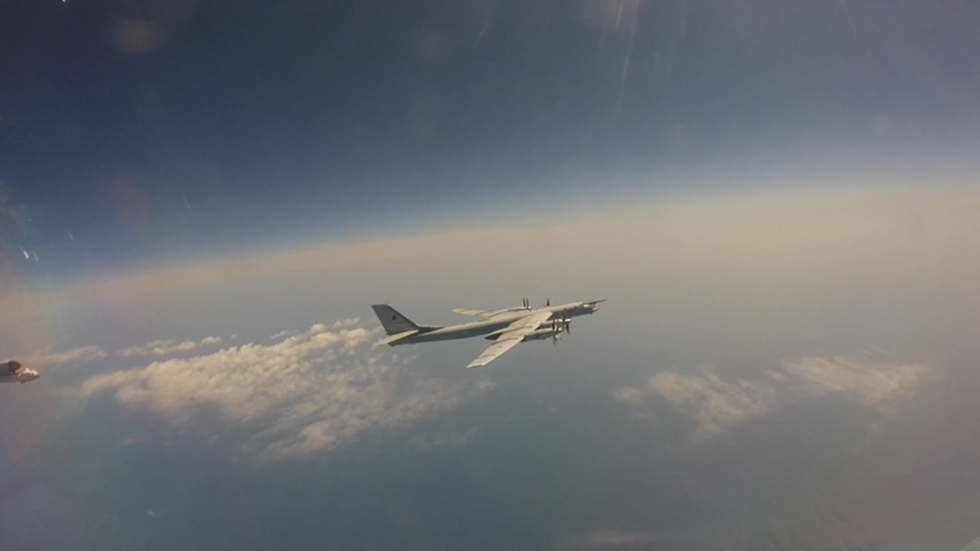 Russian and Chinese military planes conduct joint flyover