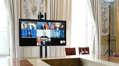 A video screen showing the G7 leaders during a summit on May 8, 2022.