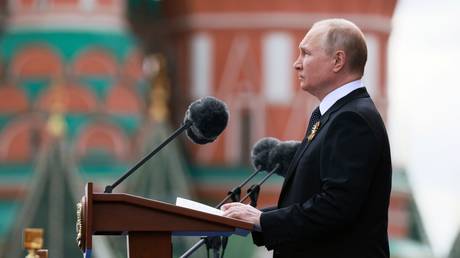 Russian President Vladimir Putin delivers a speech during a military parade on Victory Day in Red Square in Moscow, Russia.