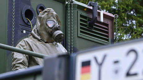 FILE PHOTO. A soldier of the German Armed Forces wears NBC protective equipment.