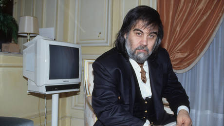 File Photo: Greek composer and keyboard player Vangelis poses at his apartment in Paris. © Rob Verhorst / Redferns