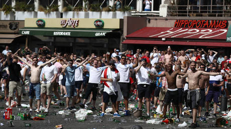 England fans clash with police on June 11, 2016 in Marseille, France - Carl Court