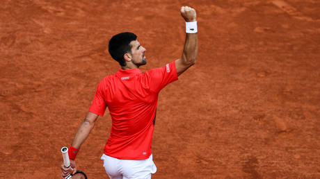 Djokovic booed as he sets up possible French Open clash with rival Nadal
