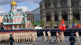 Russian Olympic hero leads brigade at Victory Day parade
