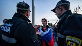 Mother condemns son’s arrest over Russian flag