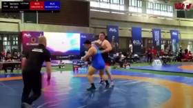 Russian wrestler punches rival in shocking scenes (VIDEO)