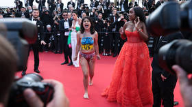 Half-naked, pro-Ukraine activist spoils red carpet at Cannes