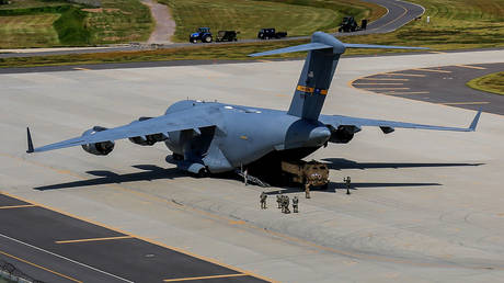 FILE PHOTO. US soldiers unload the HIMARS during the Emergency Deployment Readiness Exercise (EDRE) at Kunsan Air Base in South Korea. ©Eighth Army Public Affairs via Getty Images