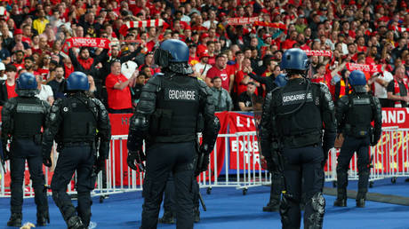 Gendarmerie stand in front of the Liverpool fans during the UEFA Champions League final match between Liverpool FC and Real Madrid. Craig Mercer